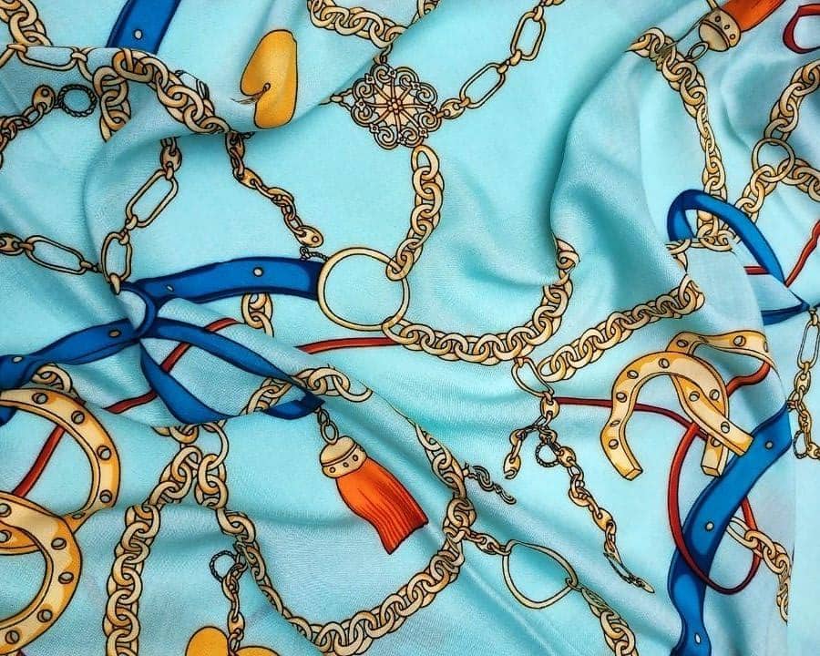Ткань штапель принт цепи на мятном фоне купить недорого в Украине
