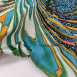 Атлас Рисунок цветной на бирюзовом фоне